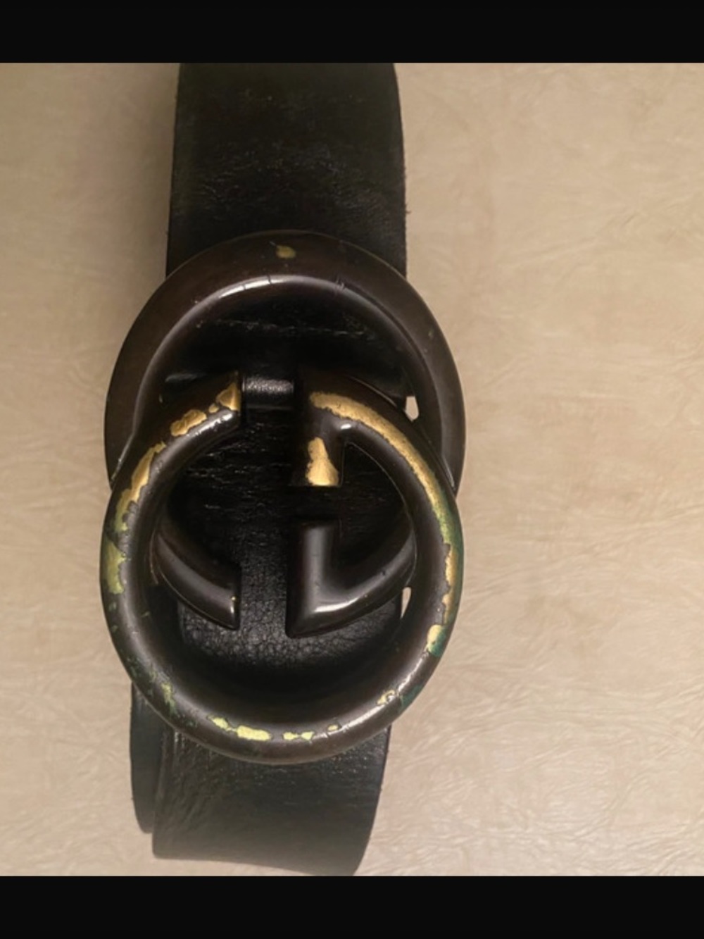 Gucci men’s belt with visible wear.
Size medium 32